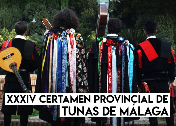 Tunos de espaldas con la capa al viento
